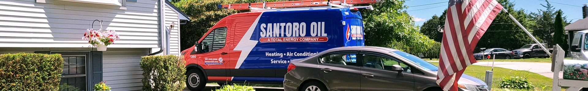 Santoro Oil service truck onsite at a home in RI or Southeastern MA